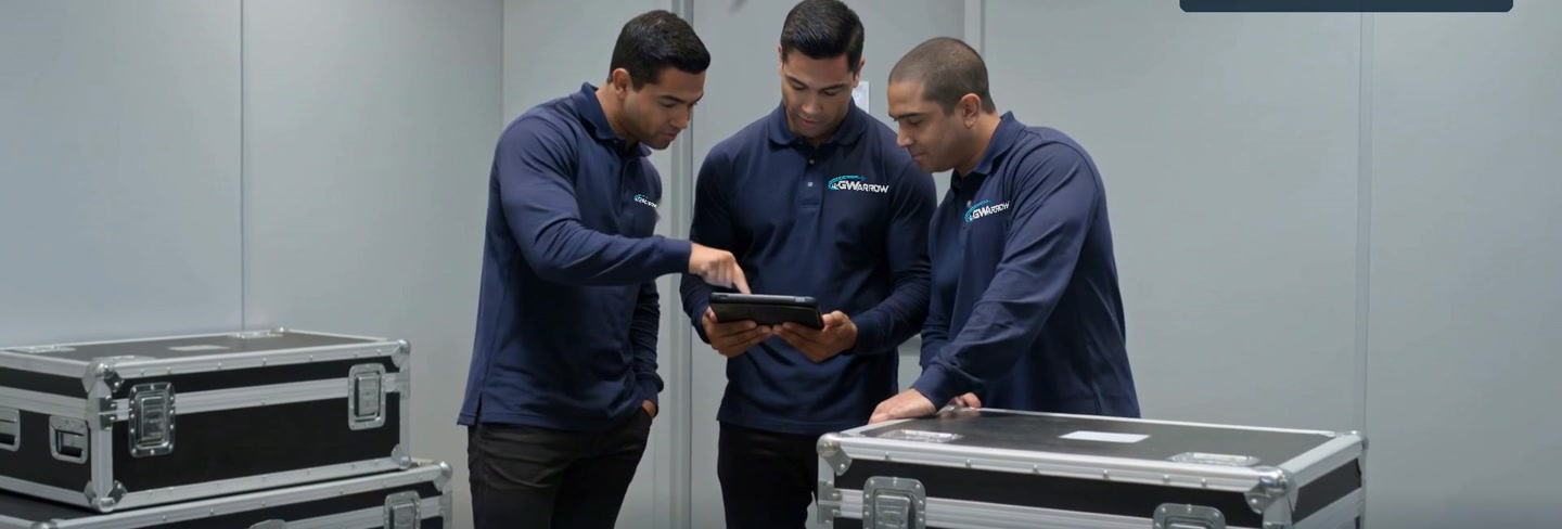 Field technicians reviewing deployment equipment